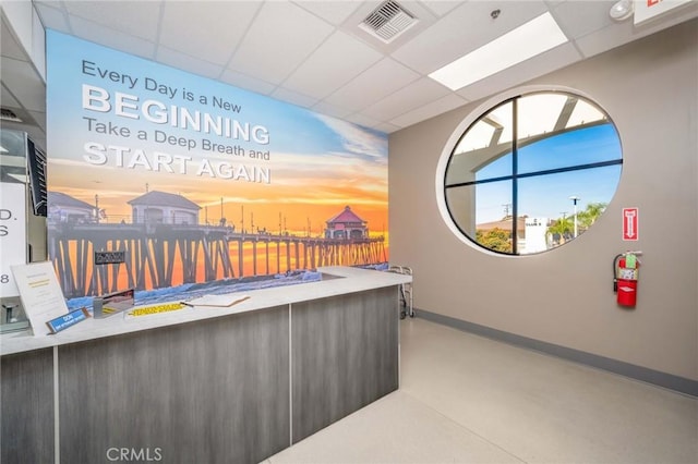reception area with a drop ceiling
