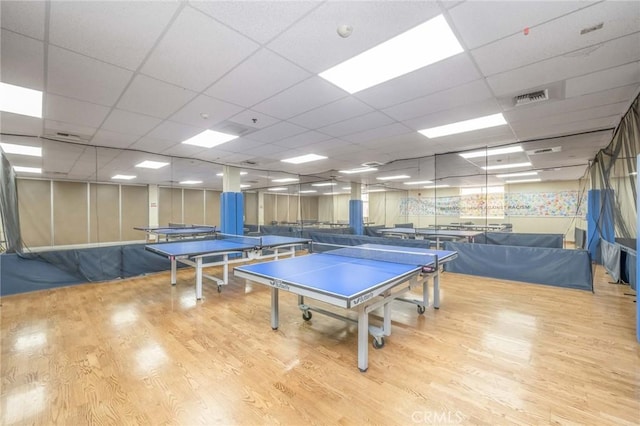 recreation room with wood finished floors