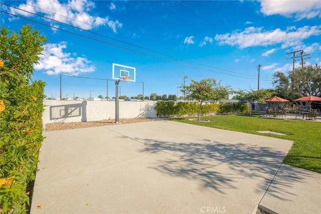 view of patio / terrace featuring basketball hoop