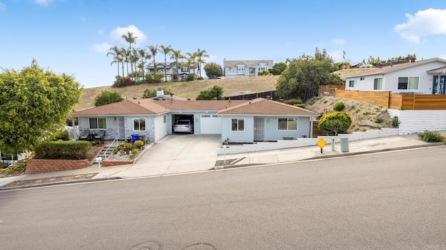 3317 Buena Hills Dr, Oceanside, CA 92056 - single story home featuring concrete driveway, a garage, and fence