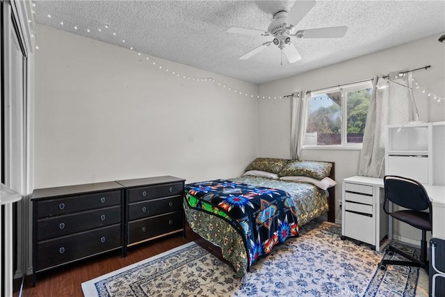 19853 Drasin Dr, Canyon Country, CA 91351 - bedroom with a textured ceiling, wood finished floors, and ceiling fan