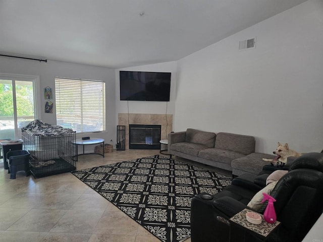 2521 Lynn Way, Vista, CA 92081 - living room featuring vaulted ceiling and a tile fireplace