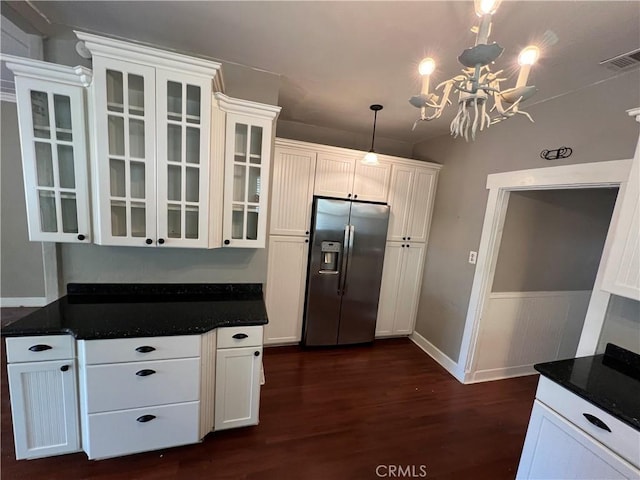 4073 Cedar St, Riverside, CA 92501 - kitchen featuring stainless steel refrigerator with ice dispenser, a chandelier, white cabinets, and dark wood-style floors