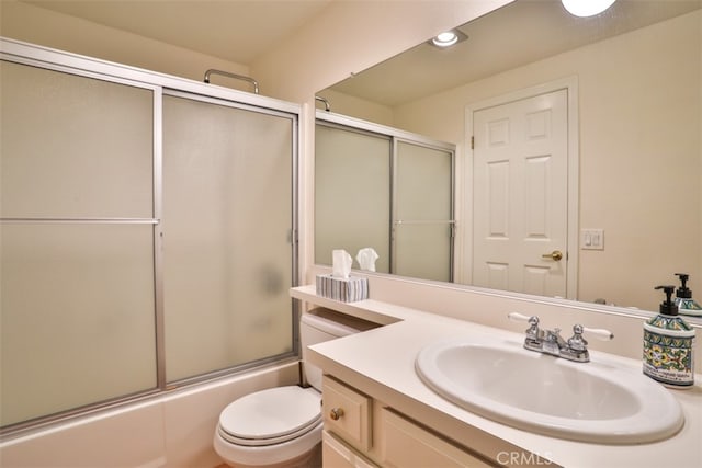 111 Greenfield, Irvine, CA 92614 - bathroom featuring toilet, enclosed tub / shower combo, vanity, and recessed lighting