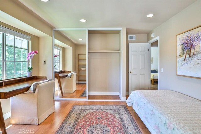111 Greenfield, Irvine, CA 92614 - bedroom with wood finished floors, baseboards, recessed lighting, and a closet