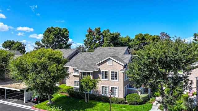 111 Greenfield, Irvine, CA 92614 - view of front facade featuring stucco siding and a front lawn