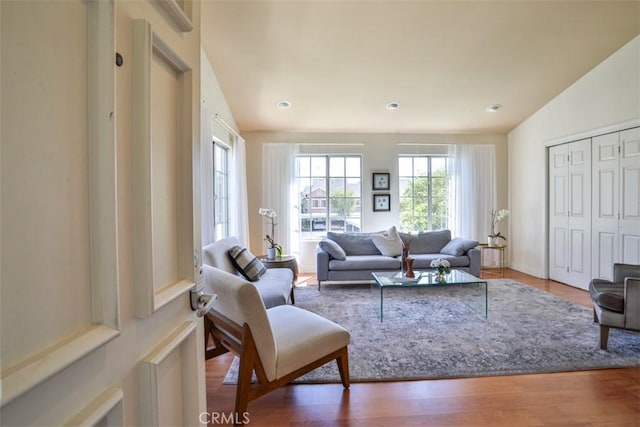 111 Greenfield, Irvine, CA 92614 - living room featuring wood finished floors, lofted ceiling, and recessed lighting