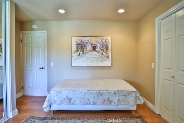111 Greenfield, Irvine, CA 92614 - bedroom with light wood-type flooring, recessed lighting, baseboards, and a closet