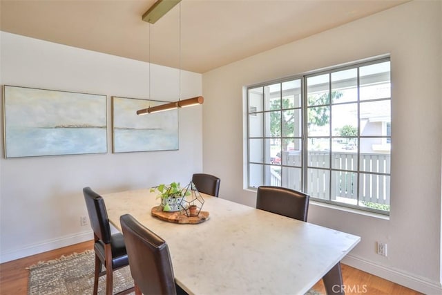 111 Greenfield, Irvine, CA 92614 - dining area featuring baseboards and wood finished floors