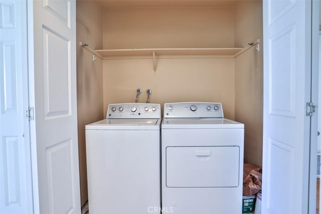 111 Greenfield, Irvine, CA 92614 - clothes washing area featuring washing machine and clothes dryer