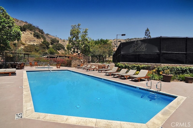 5140 Twilight Canyon Rd Unit 27H, Yorba Linda, CA 92887 - community pool with a patio area