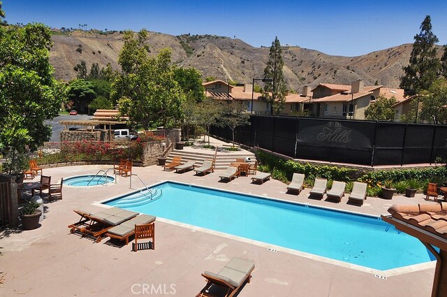 5140 Twilight Canyon Rd Unit 27H, Yorba Linda, CA 92887 - community pool with a patio and a mountain view
