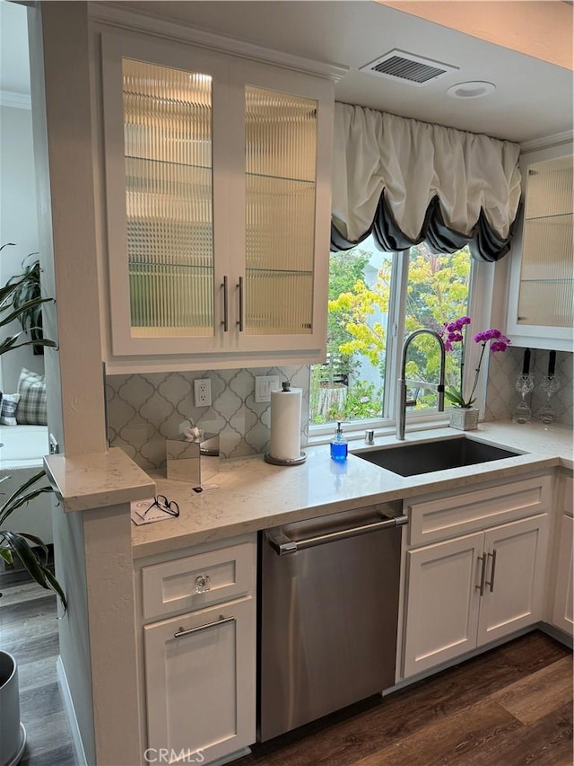 28185 Via Luis, Laguna Niguel, CA 92677 - kitchen with dishwasher, a sink, dark wood finished floors, and glass insert cabinets