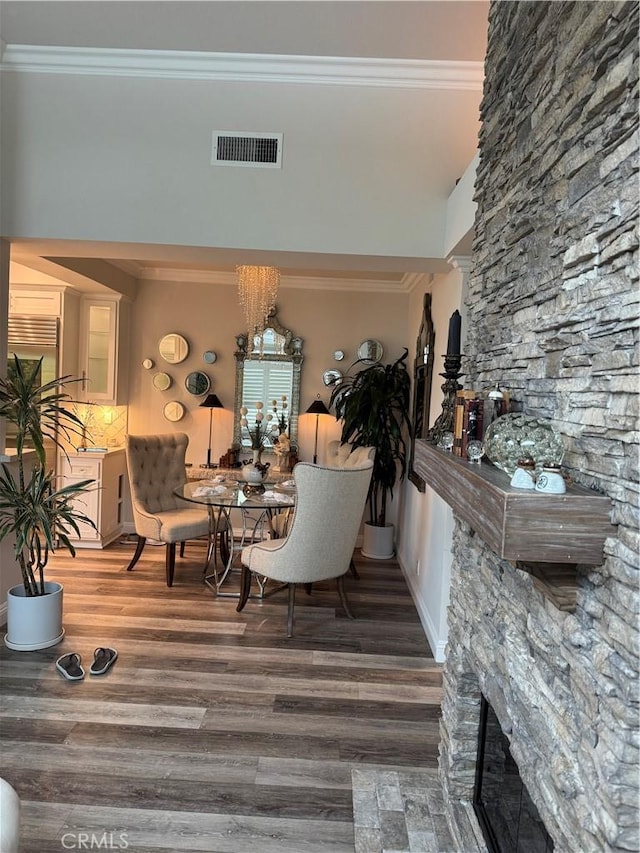 28185 Via Luis, Laguna Niguel, CA 92677 - living area with crown molding, wood finished floors, and a fireplace