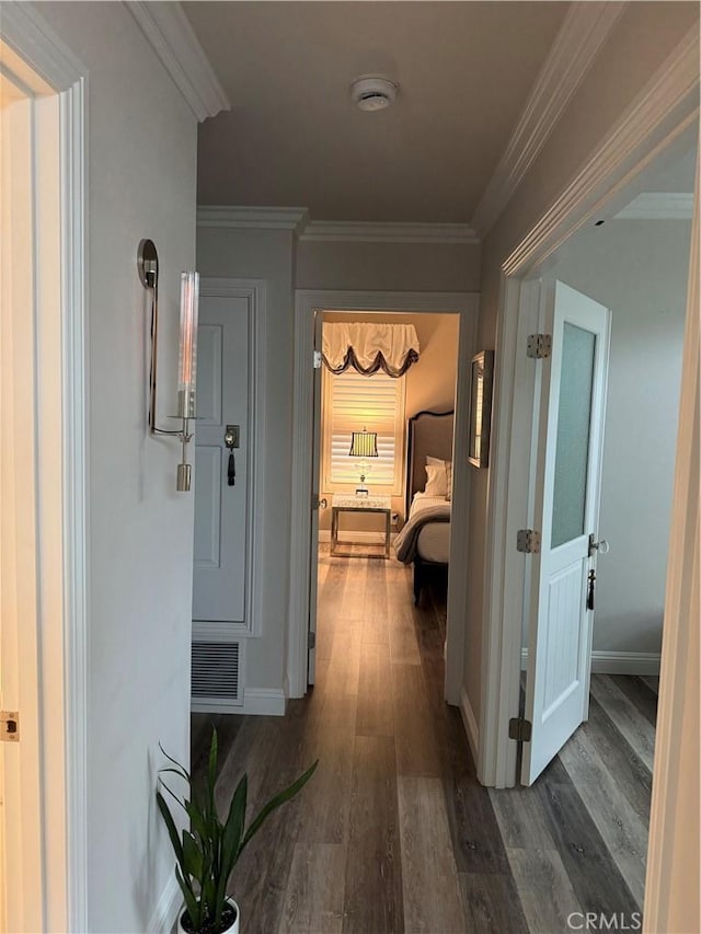 28185 Via Luis, Laguna Niguel, CA 92677 - corridor featuring dark wood finished floors, baseboards, and ornamental molding