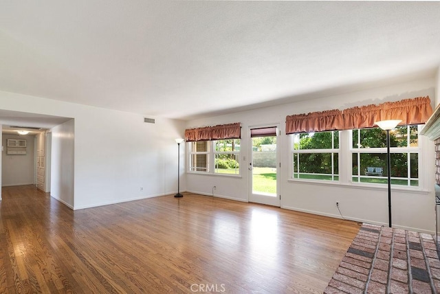 338 S La Serena Dr, West Covina, CA 91791 - unfurnished living room with wood finished floors and baseboards