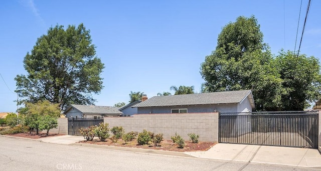 338 S La Serena Dr, West Covina, CA 91791 - view of front of house with a fenced front yard, a gate, and stucco siding