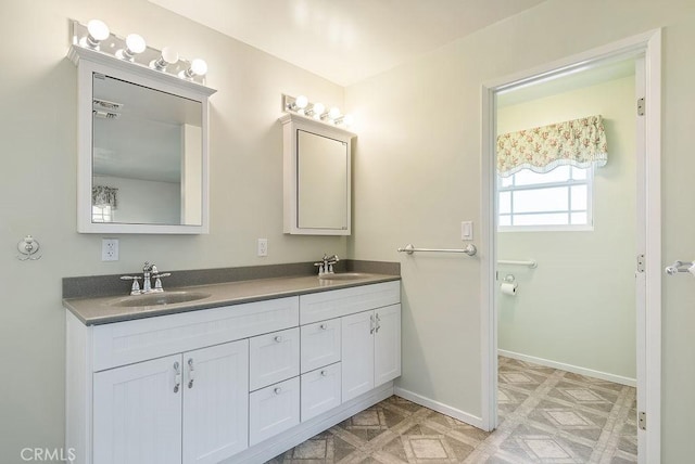 338 S La Serena Dr, West Covina, CA 91791 - full bathroom with double vanity and baseboards