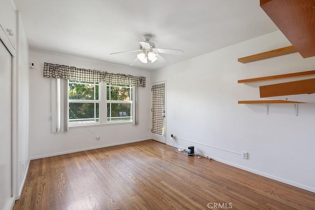 338 S La Serena Dr, West Covina, CA 91791 - spare room featuring wood finished floors, ceiling fan, and baseboards