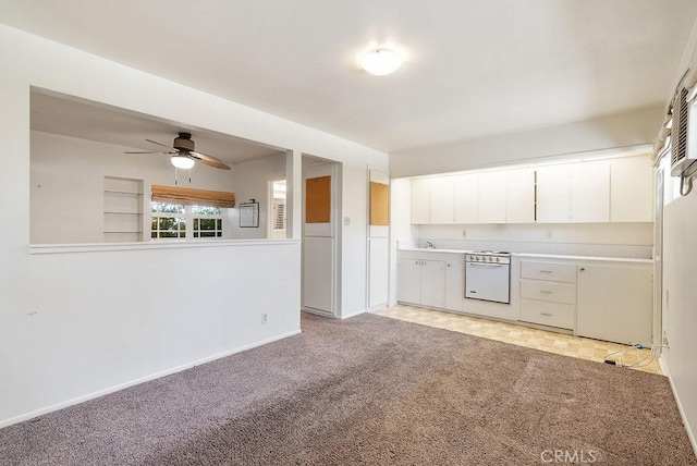 338 S La Serena Dr, West Covina, CA 91791 - kitchen featuring white electric stove, white cabinetry, a ceiling fan, light countertops, and light carpet