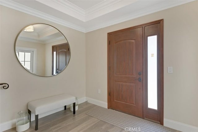 415 California St Unit D, Arcadia, CA 91006 - entryway with baseboards, light wood-style floors, ornamental molding, and a tray ceiling