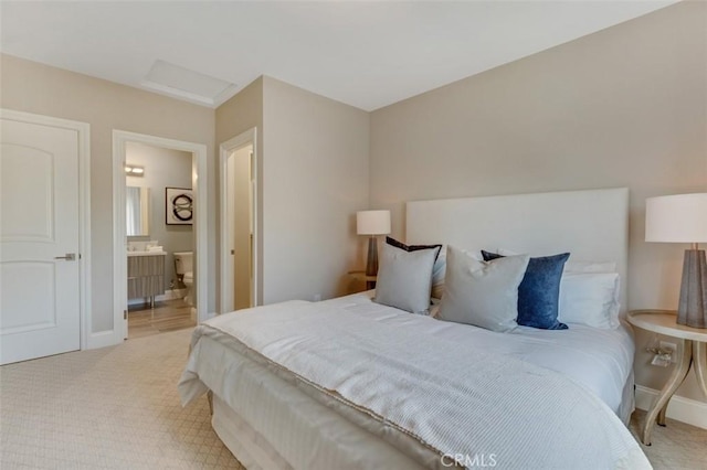 415 California St Unit D, Arcadia, CA 91006 - bedroom with light carpet, attic access, baseboards, and ensuite bath