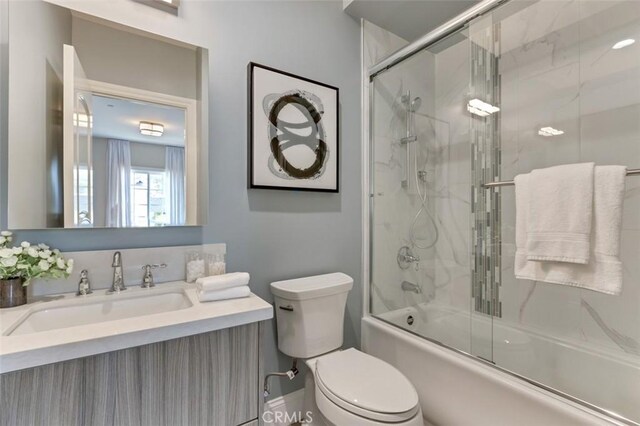 415 California St Unit D, Arcadia, CA 91006 - bathroom featuring bath / shower combo with glass door, toilet, and vanity