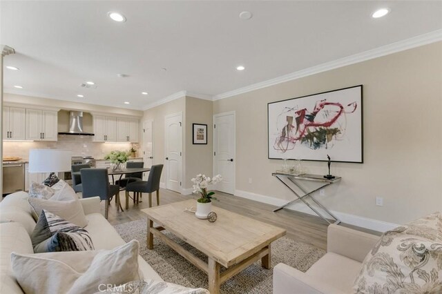415 California St Unit D, Arcadia, CA 91006 - living room with light wood-style flooring, recessed lighting, baseboards, and ornamental molding