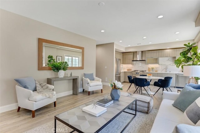 415 California St Unit D, Arcadia, CA 91006 - living room with light wood-style flooring, baseboards, and recessed lighting