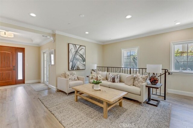 415 California St Unit D, Arcadia, CA 91006 - living area featuring plenty of natural light, light wood finished floors, baseboards, crown molding, and recessed lighting