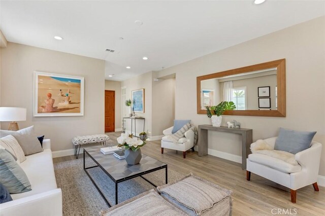 415 California St Unit D, Arcadia, CA 91006 - living area featuring light wood-style floors, recessed lighting, and baseboards