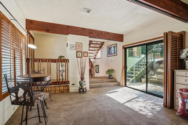 28330 Meadow Glen Way W, Escondido, CA 92026 - living area with carpet flooring, stairs, a textured ceiling, and beam ceiling