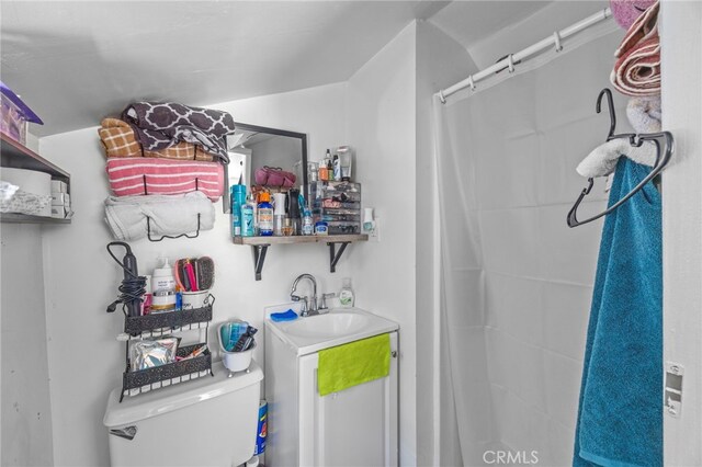 1709 S Townsend St, Santa Ana, CA 92704 - full bath featuring toilet, a shower with shower curtain, and vanity