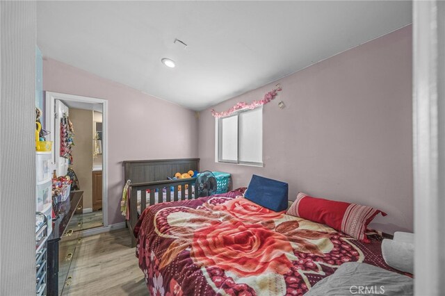 1709 S Townsend St, Santa Ana, CA 92704 - bedroom featuring wood finished floors and vaulted ceiling