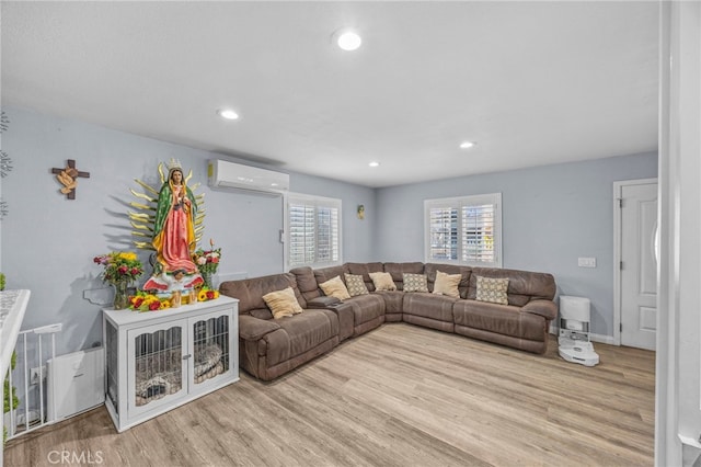 1709 S Townsend St, Santa Ana, CA 92704 - living area with an AC wall unit, wood finished floors, and recessed lighting