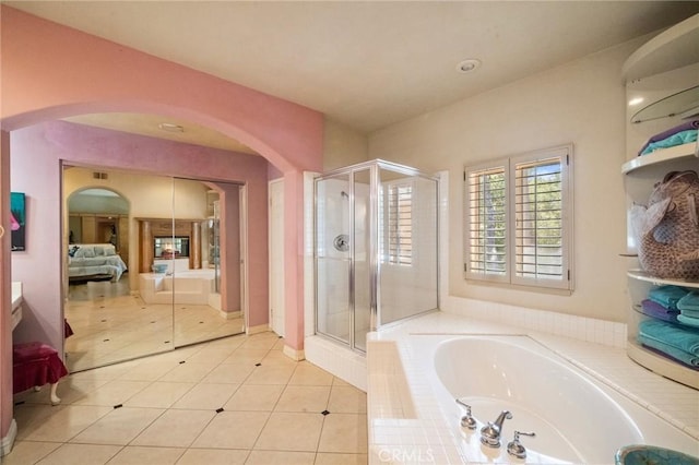 81 Via Barcaza, Coto De Caza, CA 92679 - ensuite bathroom featuring a bath, a shower stall, and tile patterned flooring