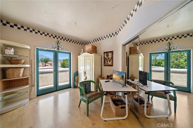 81 Via Barcaza, Coto De Caza, CA 92679 - dining room with french doors, a chandelier, and plenty of natural light