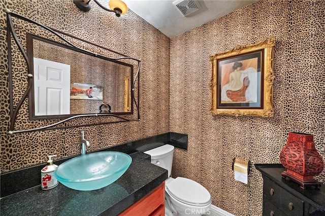 81 Via Barcaza, Coto De Caza, CA 92679 - bathroom featuring toilet, vanity, and backsplash