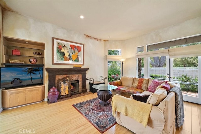 81 Via Barcaza, Coto De Caza, CA 92679 - living room with wood finished floors, a fireplace, and recessed lighting