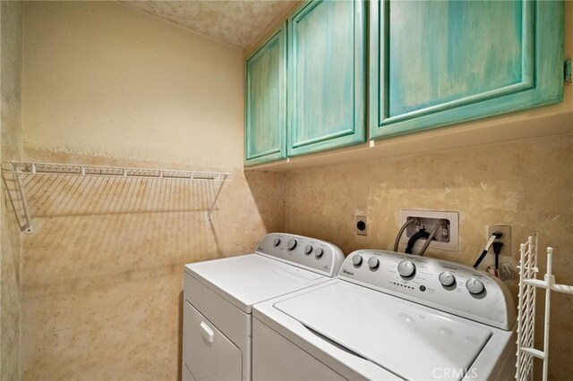 81 Via Barcaza, Coto De Caza, CA 92679 - laundry room featuring cabinet space and washer and clothes dryer
