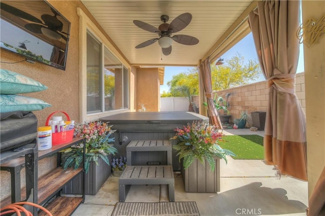 14663 Round Leaf Rd, Moreno Valley, CA 92555 - fenced backyard featuring a covered hot tub, a ceiling fan, and a patio
