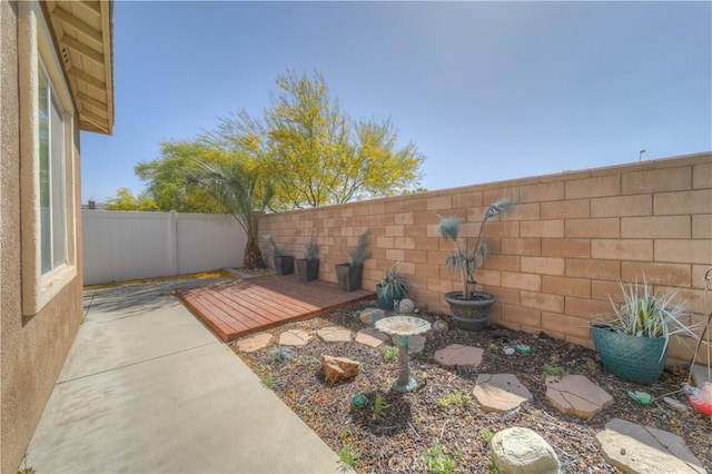 14663 Round Leaf Rd, Moreno Valley, CA 92555 - fenced backyard featuring a deck and a patio
