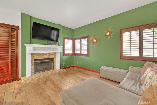 13023 Avenida Empresa, Riverside, CA 92503 - living area with wood finished floors and a glass covered fireplace