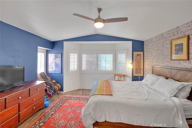 13023 Avenida Empresa, Riverside, CA 92503 - bedroom with an accent wall, wood finished floors, lofted ceiling, and ceiling fan