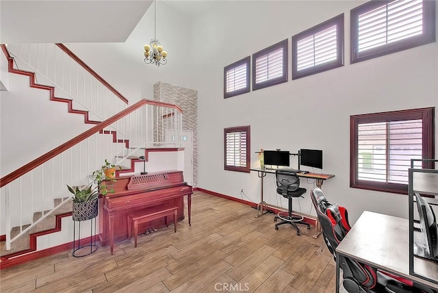 13023 Avenida Empresa, Riverside, CA 92503 - office space featuring a high ceiling, a chandelier, wood finished floors, and plenty of natural light