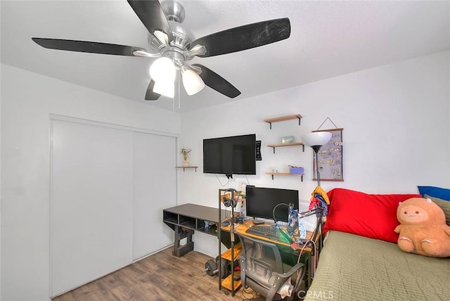 13023 Avenida Empresa, Riverside, CA 92503 - bedroom featuring wood finished floors, an office area, ceiling fan, and a closet