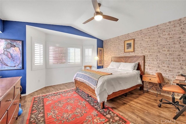 13023 Avenida Empresa, Riverside, CA 92503 - bedroom with vaulted ceiling, wood finished floors, a ceiling fan, and an accent wall