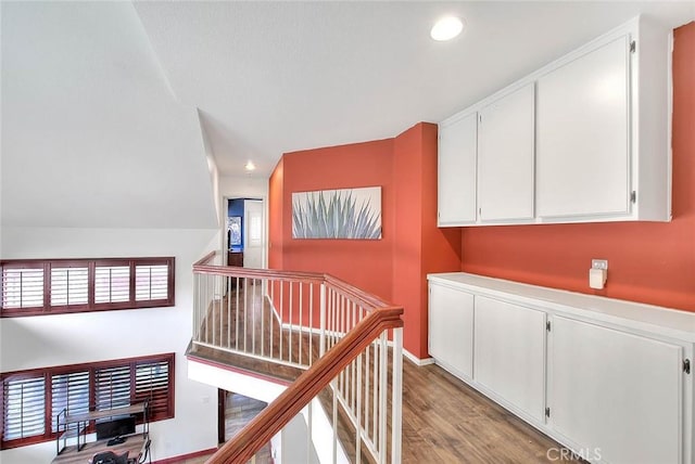 13023 Avenida Empresa, Riverside, CA 92503 - corridor featuring an upstairs landing, light wood-type flooring, recessed lighting, and vaulted ceiling