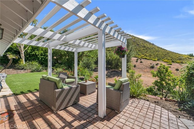 view of patio with a pergola, a mountain view, and an outdoor hangout area