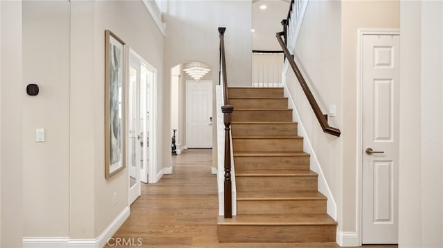 11815 Briarrose Ln, Chino, CA 91710 - stairs featuring wood finished floors and baseboards